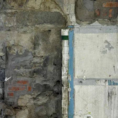 Detail from a defurbished interior in Edinburgh offices - stone and older tiling is revealed and left exposed.