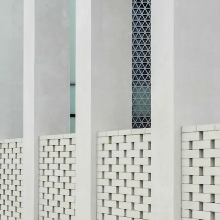 Detail of brick lattice and concrete pillars at Inverness Justice Centre.